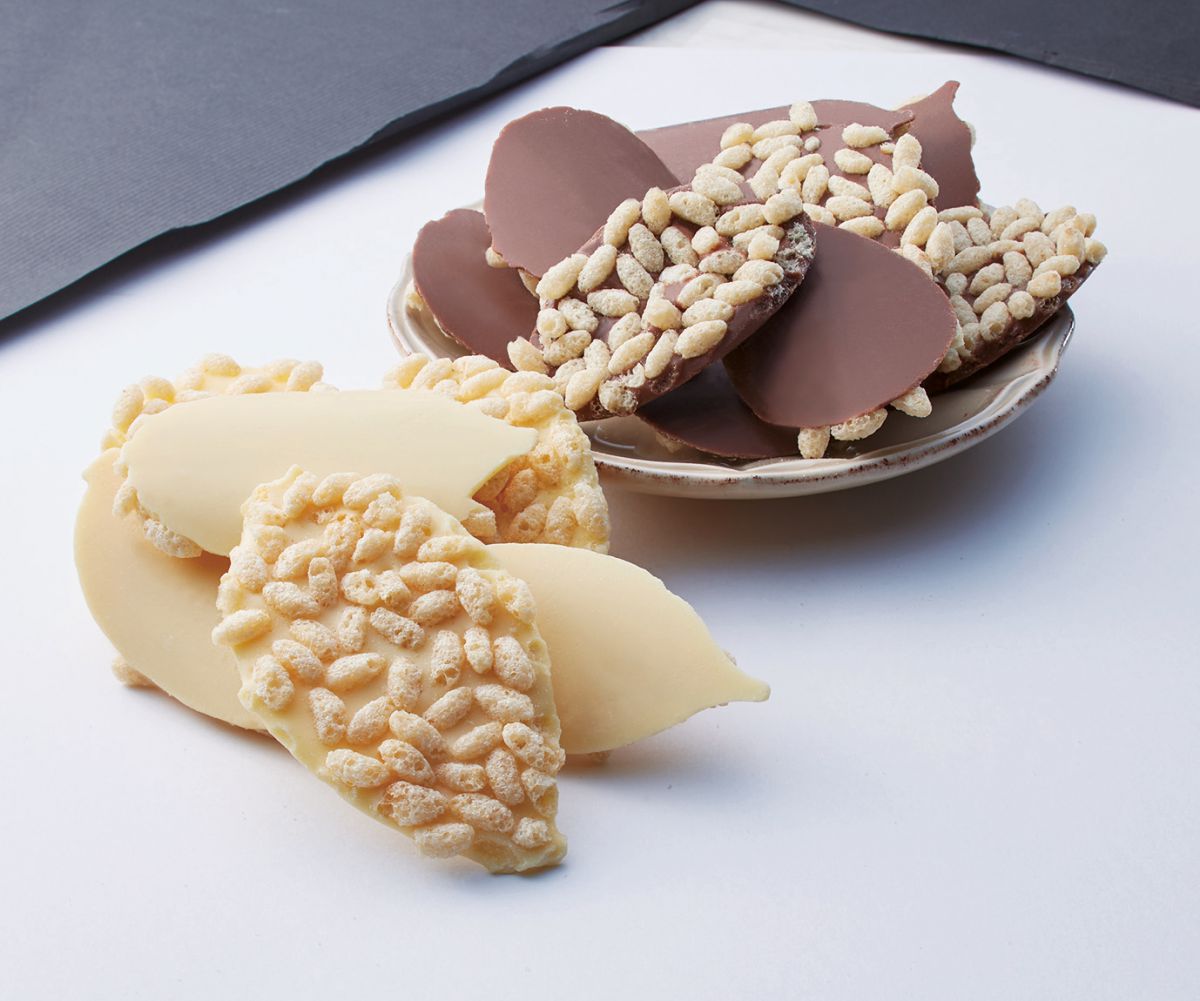 「ドルチェ ヴィータ」パフチョコチップス100ｇあたり680円　