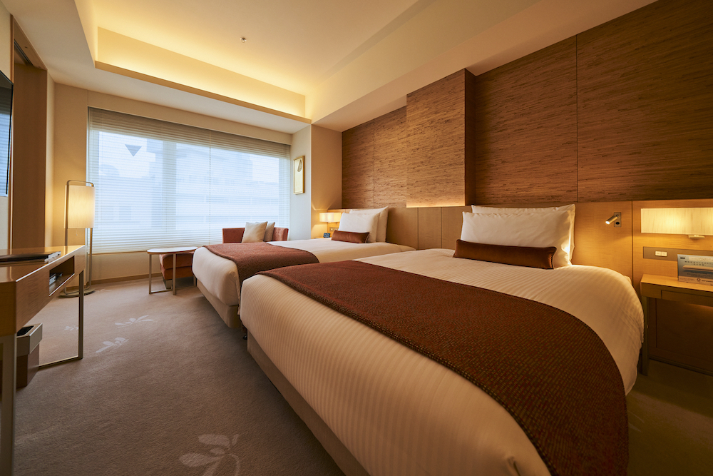 「シーズナルスイート：オータム（秋）」のベッドルーム