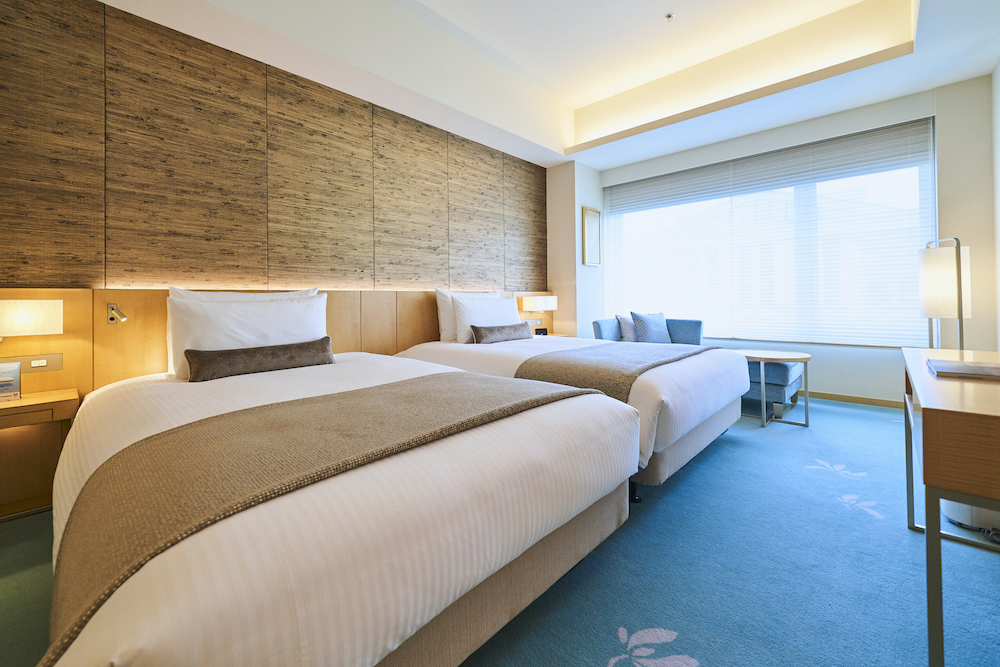 「シーズナルスイート：サマー（夏）」のベッドルーム