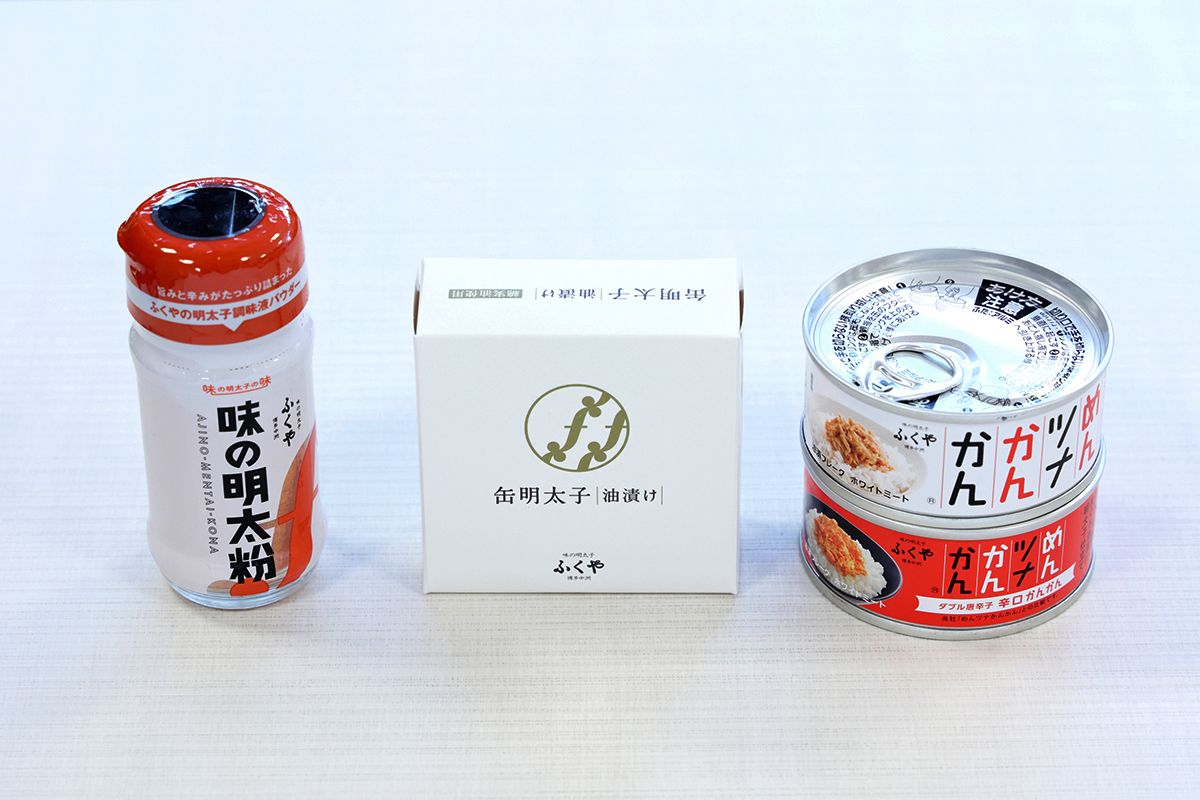 （左から）「味の明太粉」600円、「缶明太子 油漬け」756円、「めんツナかんかん」（写真上レギュラー、写真下辛口）各300円