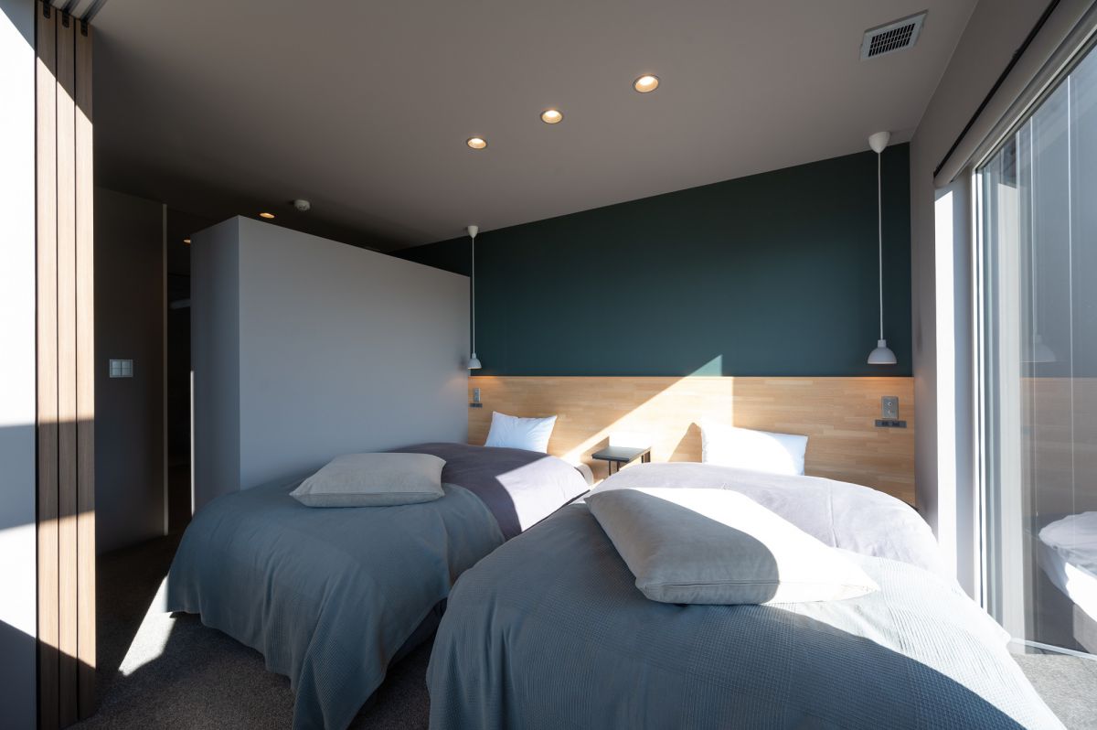 「MAOIQ komfort」の1階ベッドルーム