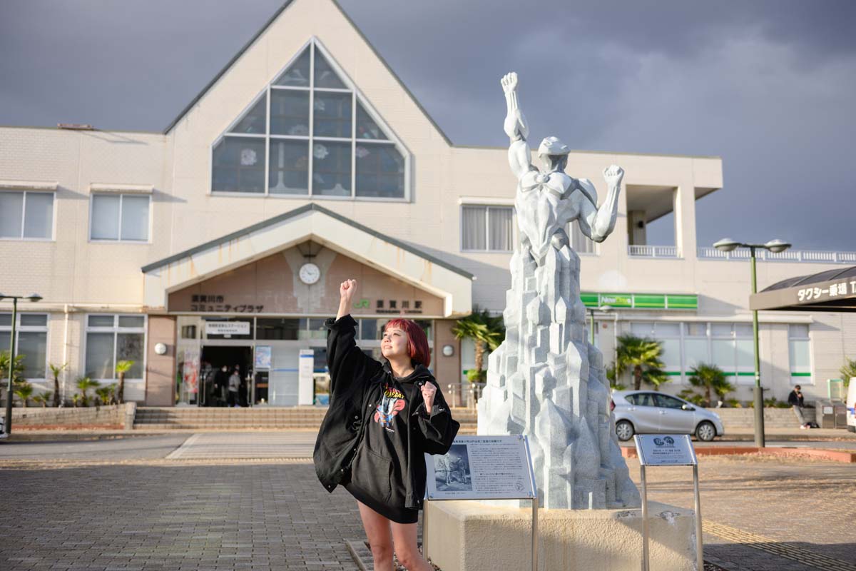 石像と記念写真