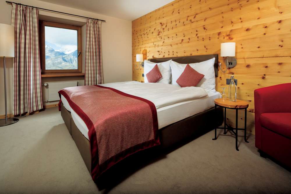 木をふんだんに使用した客室は、ぬくもりたっぷりの癒やし空間