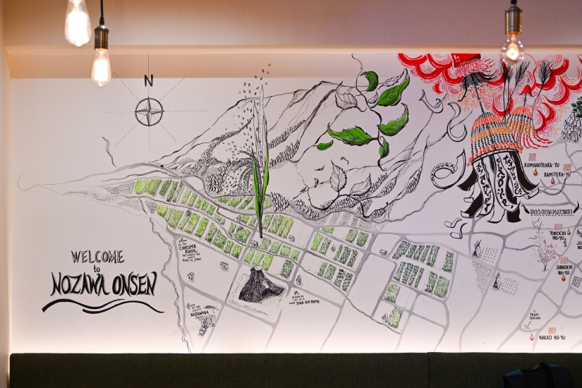 オーストラリアのアーティストが野沢温泉村を散策し、印象に残った風景やできごとなどを描いた地図