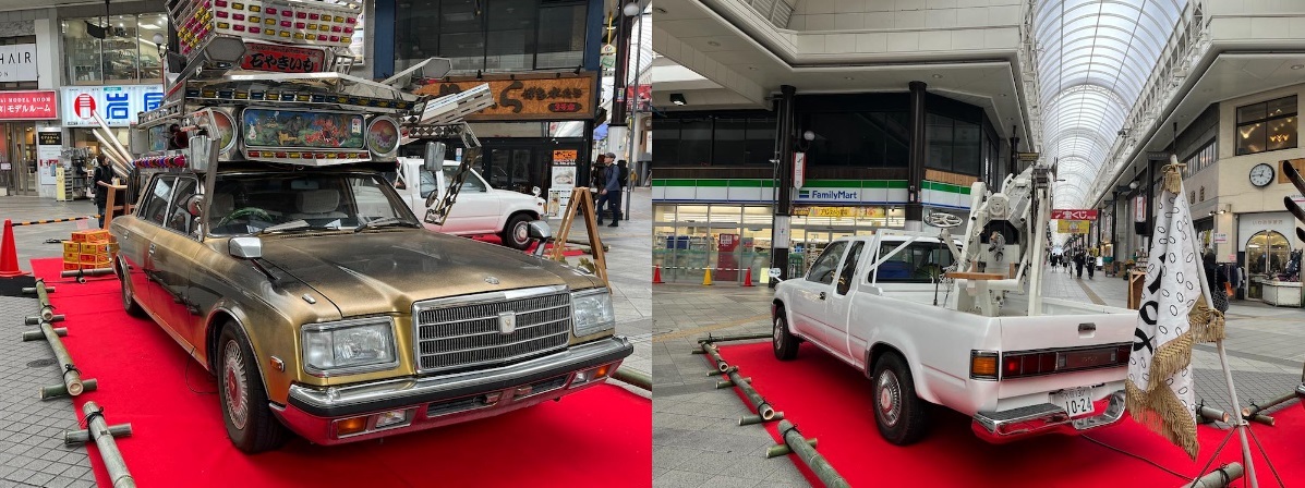 ガレリア竹町に停車中のYOTTAの作品、《金時》（左）と《穀》（右）