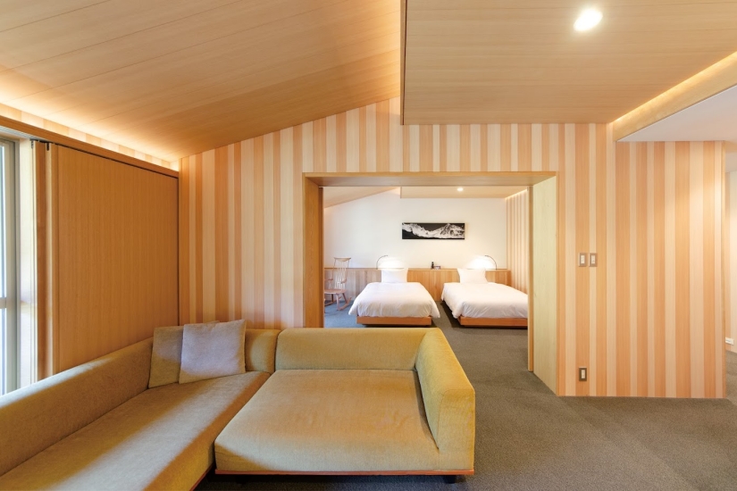 76m²の広さを備えるスイートルーム。山岳リゾートと呼ぶに相応しい趣を備えている