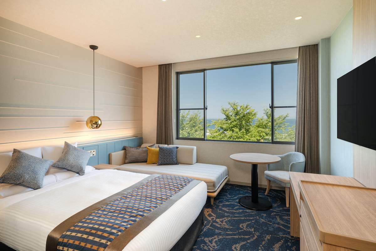 「オーシャンビュースーペリアダブル」(2名1室 1泊2食付き1人1万9400円(入湯税別)〜/22.7㎡・定員3名)