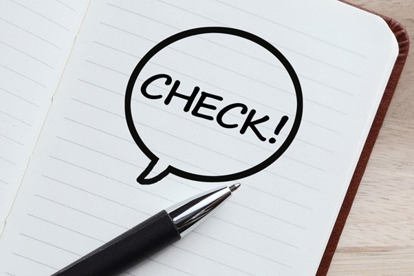 CHECK ! と書かれたノート