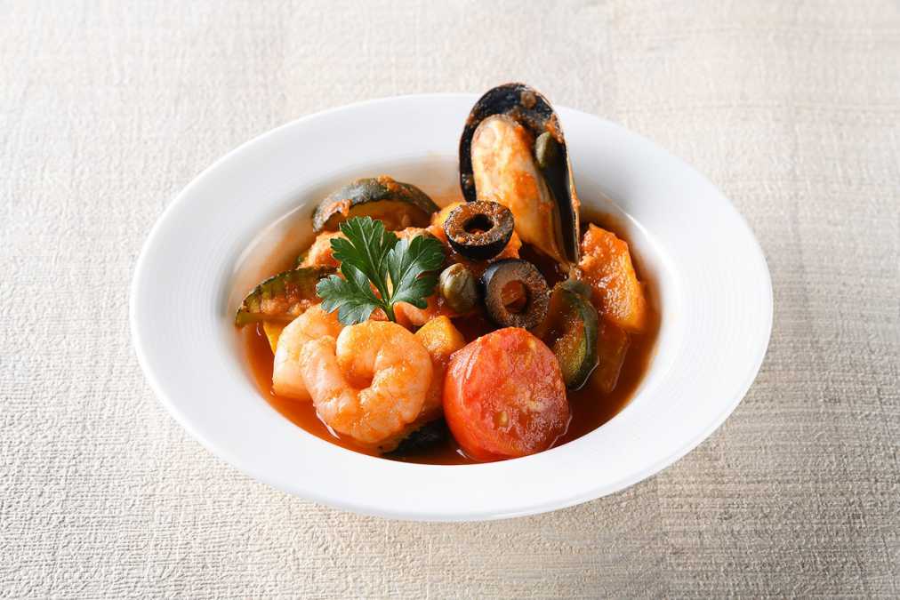 350g野菜相当量のAコース料理イメージ（5品目: 魚介のトマトパッツァ）[含まれる野菜相当量:49g]