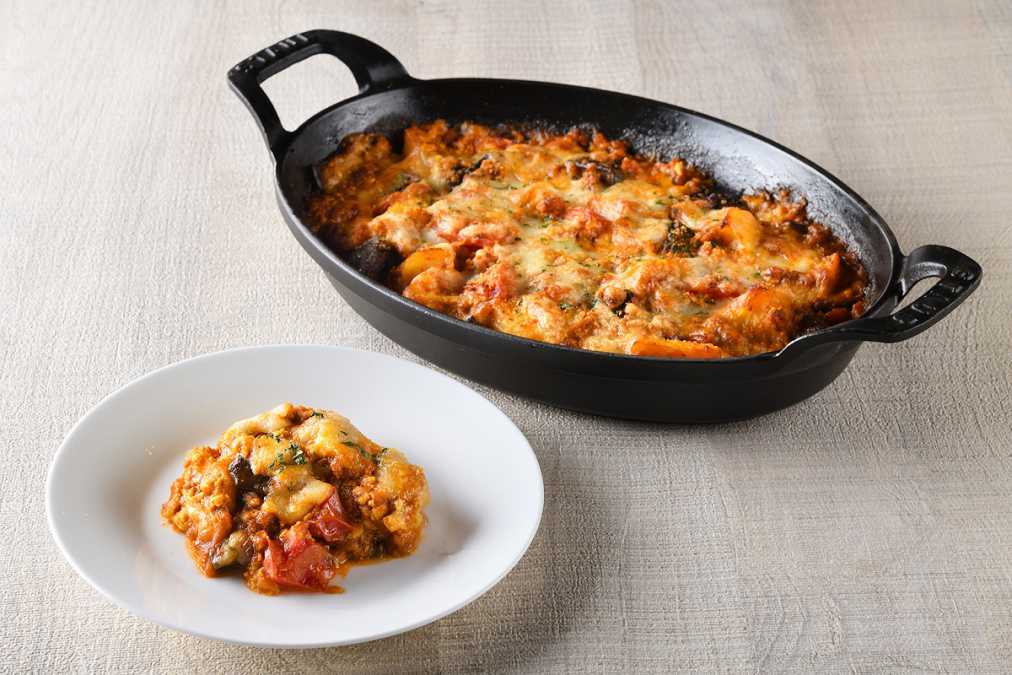 350g野菜相当量のAコース料理イメージ（4品目: 茄子のカレー風味ミートグラタン）[含まれる野菜相当量:78g]